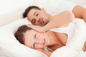 Woman not wanting to hear snoring in the bedroom